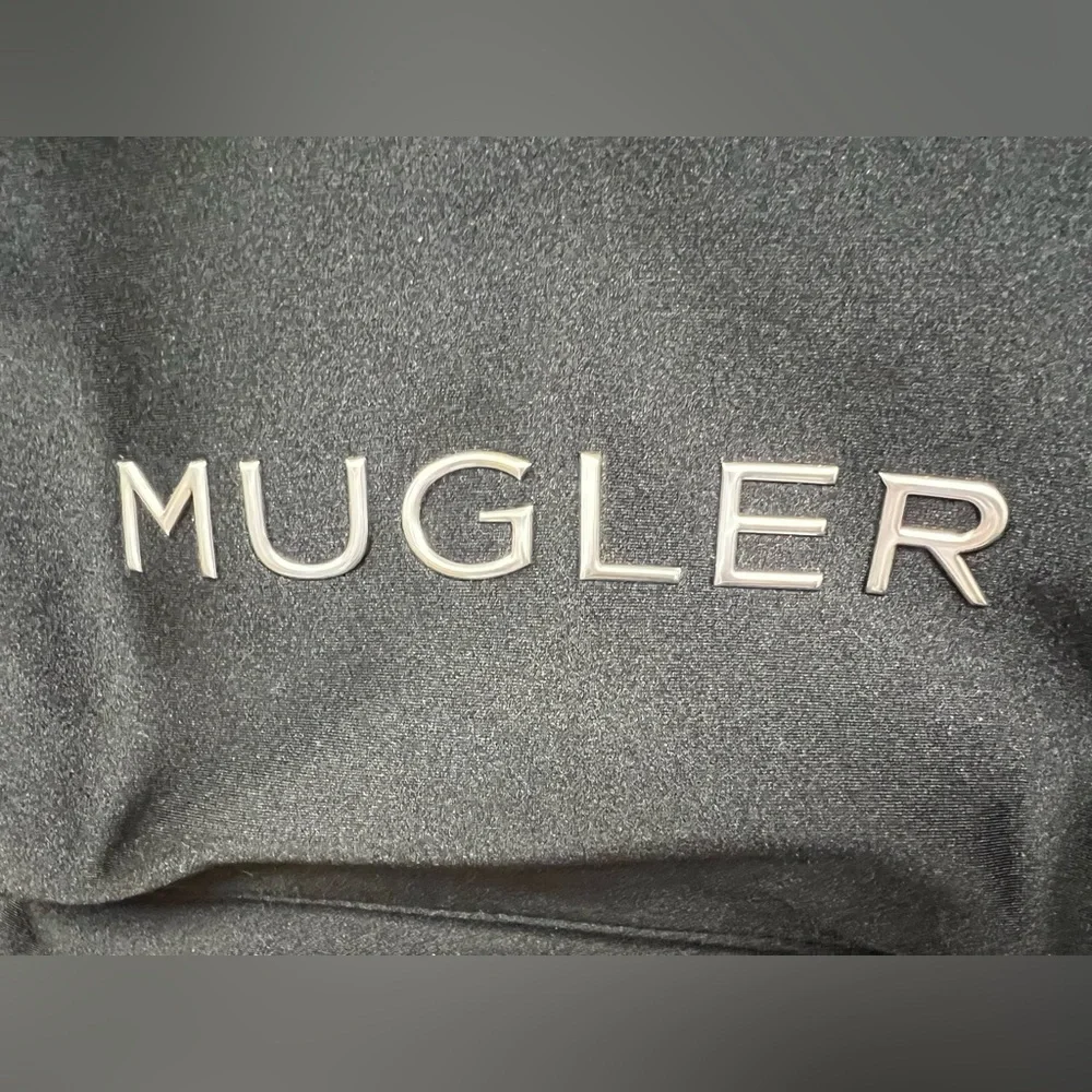 Mugler - Black Backpack- New, plastic over‎ two zippers, Apprx: 11”x13”